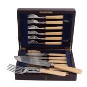 A cased set of six silver fish knives and forks by Viners Ltd A cased set of six silver fish