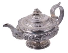 A George IV silver compressed spherical pedestal tea pot by George Burrows II A George IV silver