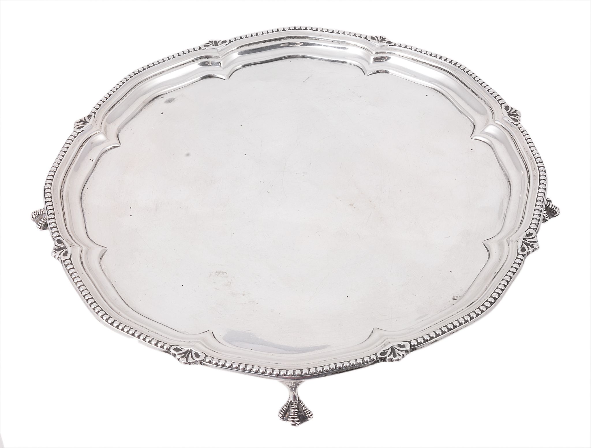 A shaped silver circular salver by Harrison Brothers & Howson, Sheffield 1917 A shaped silver