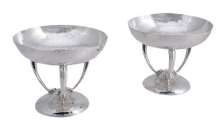 A pair of Edwardian silver sweet stands by The Goldsmiths & Silversmiths Co A pair of Edwardian