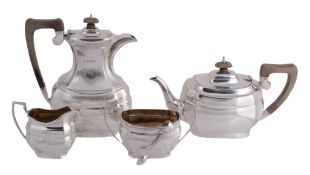 A silver four piece oblong baluster tea service, maker`s mark `C A silver four piece oblong baluster
