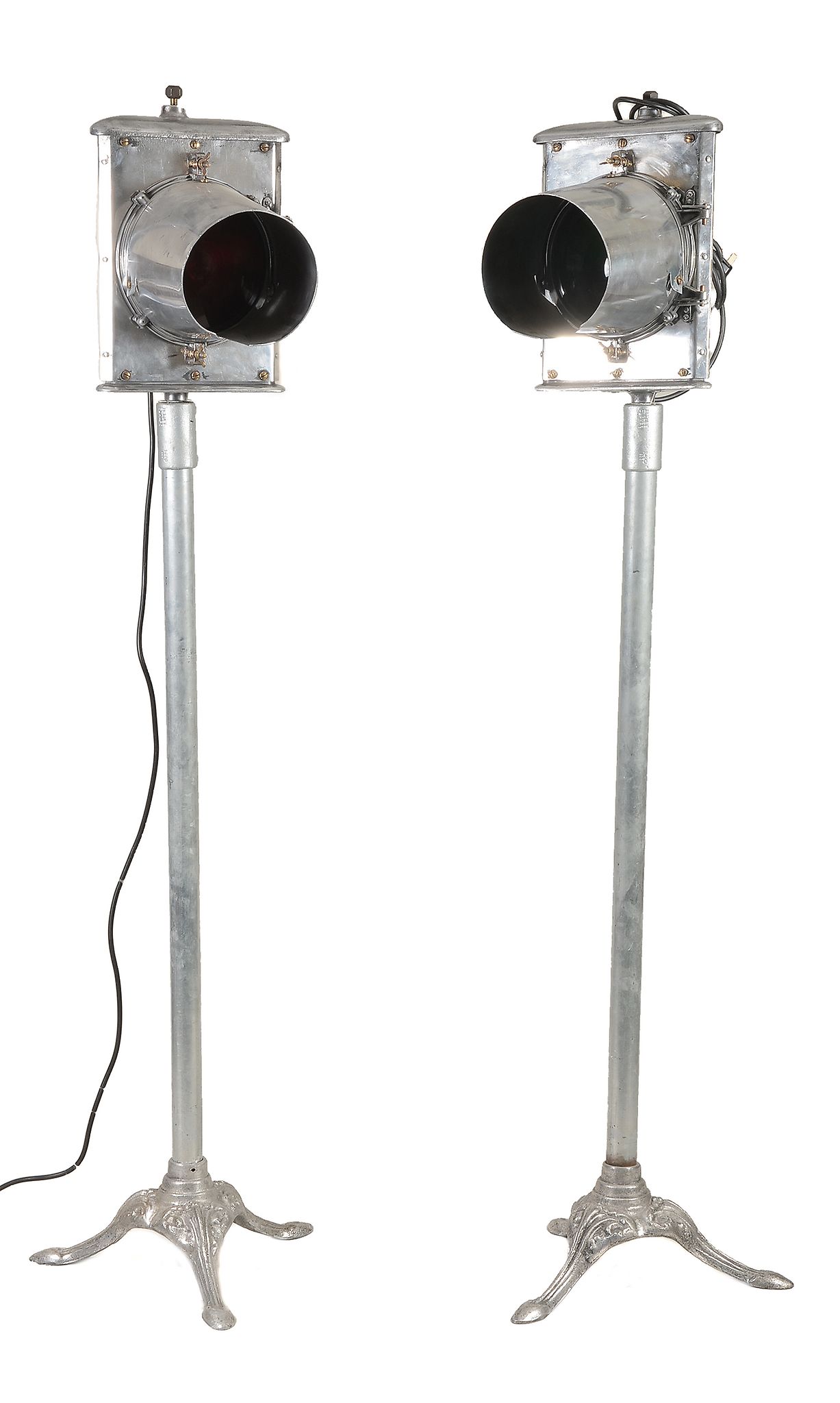 A pair of aluminium railway signal lamps later mounted as standard lamps A pair of aluminium