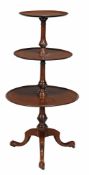 A 19th century mahogany three tier dumb waiter, with moulded dish edge to tiers A 19th century