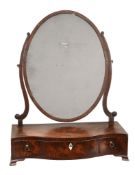 A George III mahogany serpentine fronted dressing mirror, circa 1770 A George III mahogany