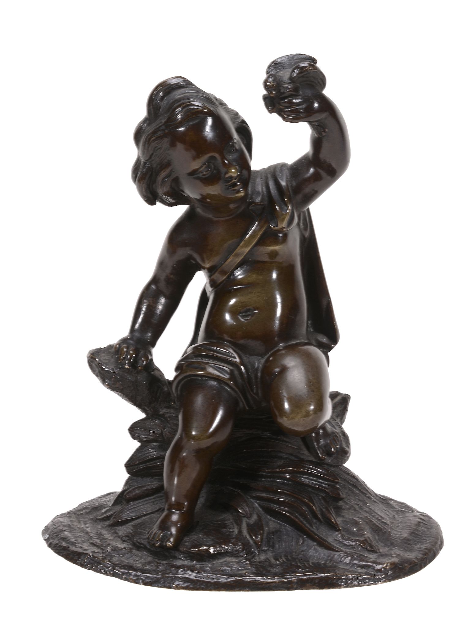 A French patinated bronze model of a putto, mid 19th century A French patinated bronze model of a