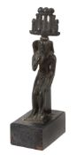 An Egyptian bronze model of Harpocrates, Late Period, circa 664-332 B.C An Egyptian bronze model of