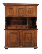 A Continental walnut cupboard, second half 18th Century A Continental walnut cupboard, second half