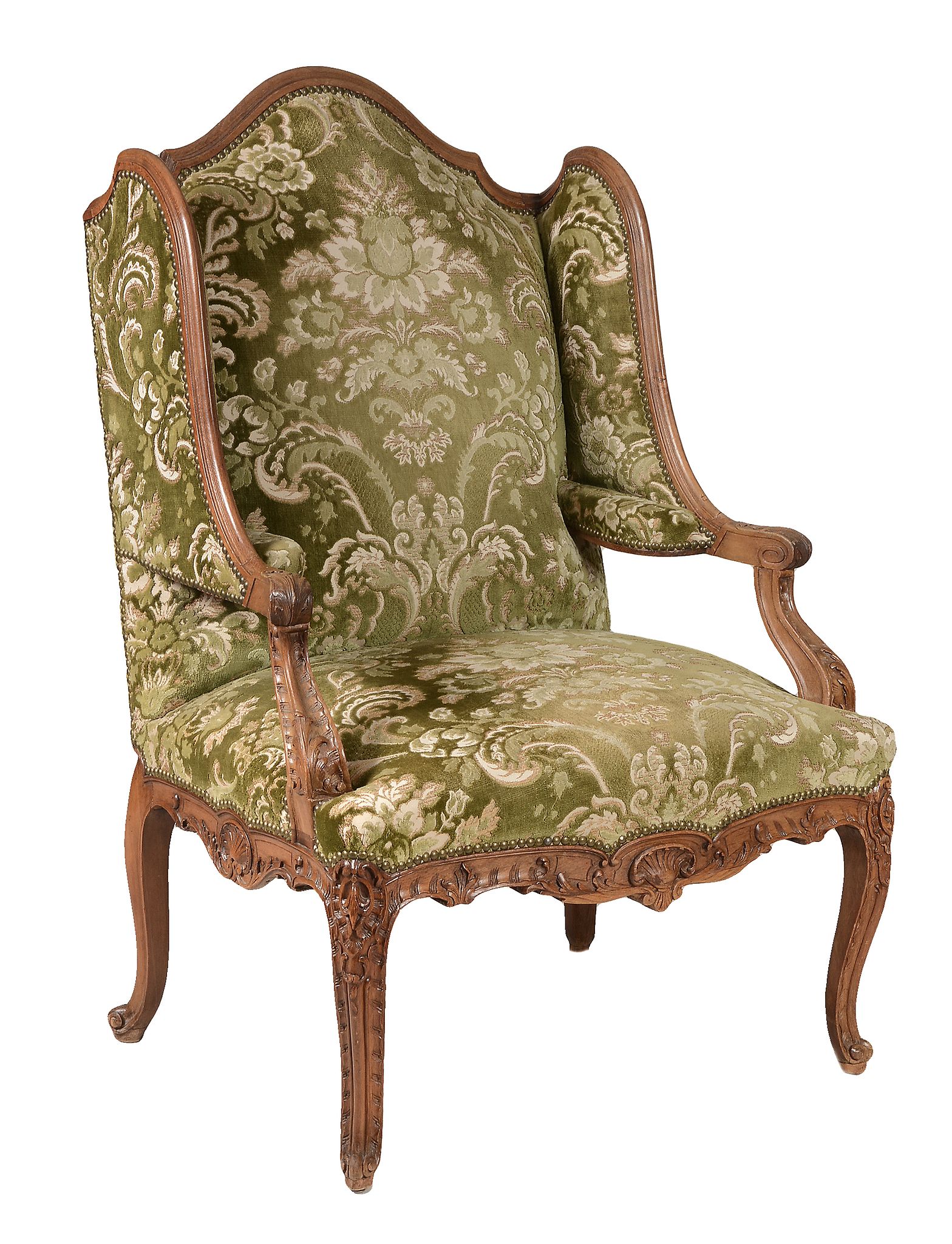 A carved beech high back armchair in French 18th century style, circa 1900 A carved beech high back