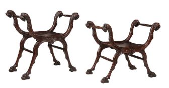 A matched pair of carved hardwood X framed stools A matched pair of carved hardwood X framed