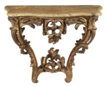 A carved giltwood and marble mounted console table in Louis XV style A carved giltwood and marble