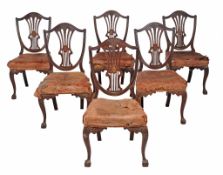 A set of twelve mahogany and marquetry dining chairs in George III style... A set of twelve