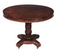 A William IV mahogany centre table circa 1830 the circular crossbanded top... A William IV mahogany
