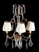 A pair of Continental, probably Italian gilt wrought iron and glass mounted... A pair of