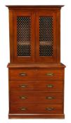 A Victorian mahogany cabinet on chest, circa 1860, of campaign type A Victorian mahogany cabinet on