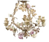 A Continental gilt metal and porcelain mounted six light chandelier A Continental gilt metal and