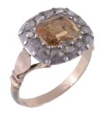 An early 19th century yellow topaz and diamond cluster ring  An early 19th century yellow topaz