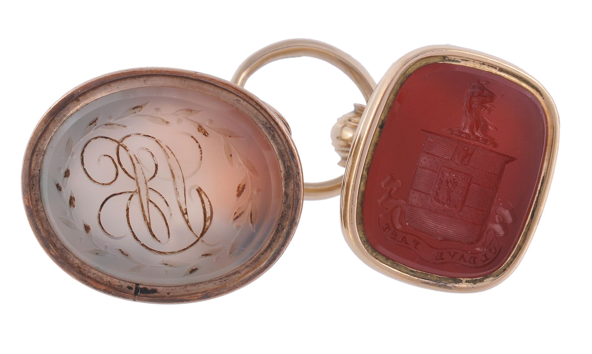 Two 19th century hardstone fob seals, the first seal with a cornelian panel  Two 19th century