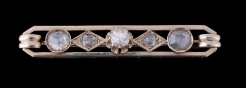 An Art Deco diamond brooch, circa 1920, the openwork panel set with a...  An Art Deco diamond