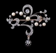 An Art Nouveau diamond and pearl brooch, circa 1910  An Art Nouveau diamond and pearl brooch,