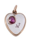 A gold rock crystal and ruby heart shaped pendant , circa 1900  A gold rock crystal and ruby heart