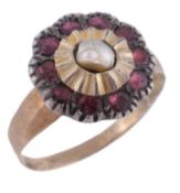 An Italian 19th century garnet and pearl ring  An Italian 19th century garnet and pearl ring,    the