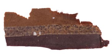 A Coptic textile fragment from a tunic, possibly 7th-6th century A.D., 31cm long. There is no