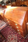 A George III mahogany bureau with fitted interior and four long graduated drawers 108cm wide