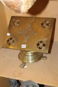 A Victorian brass bible lectern set on a spreading base raised on paw feet. There is no condition