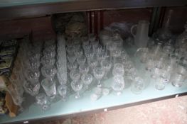 A large quantity of glassware, champagne flutes, wine and brandy glasses etc. There is no