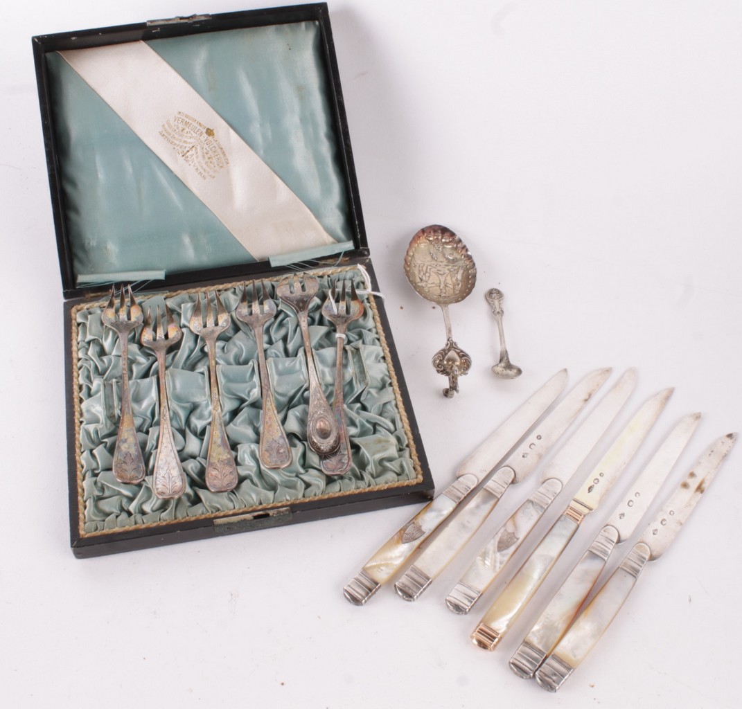 A collection of Continental silver coloured flatware, to include: six French fruit knives, 1809 -