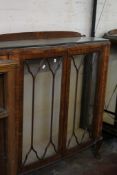A 20th Century walnut china display cabinet 119cm wide. There is no condition report available on