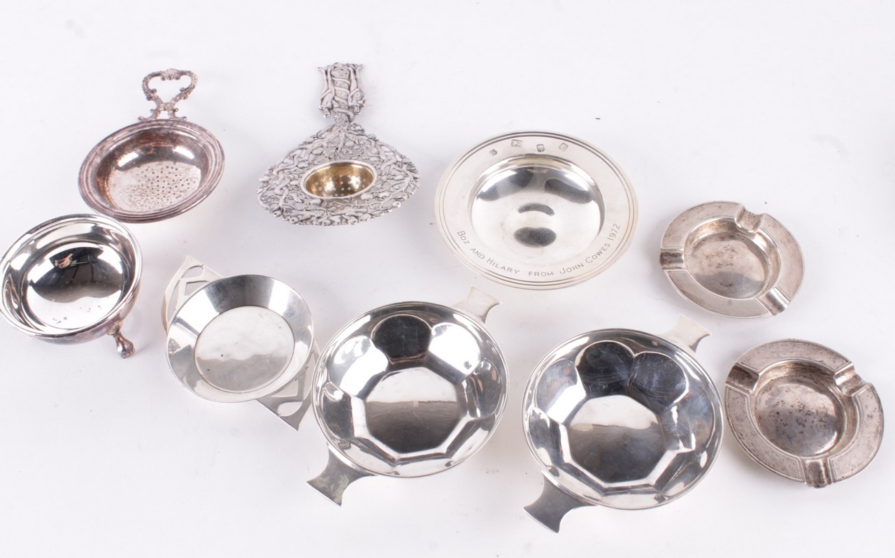 A collection of small silver items, to include: a pair of circular facetted quaiches by Mappin &