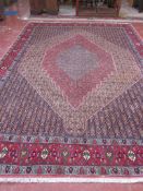 A Persian carpet approx. 358 x 250cm
