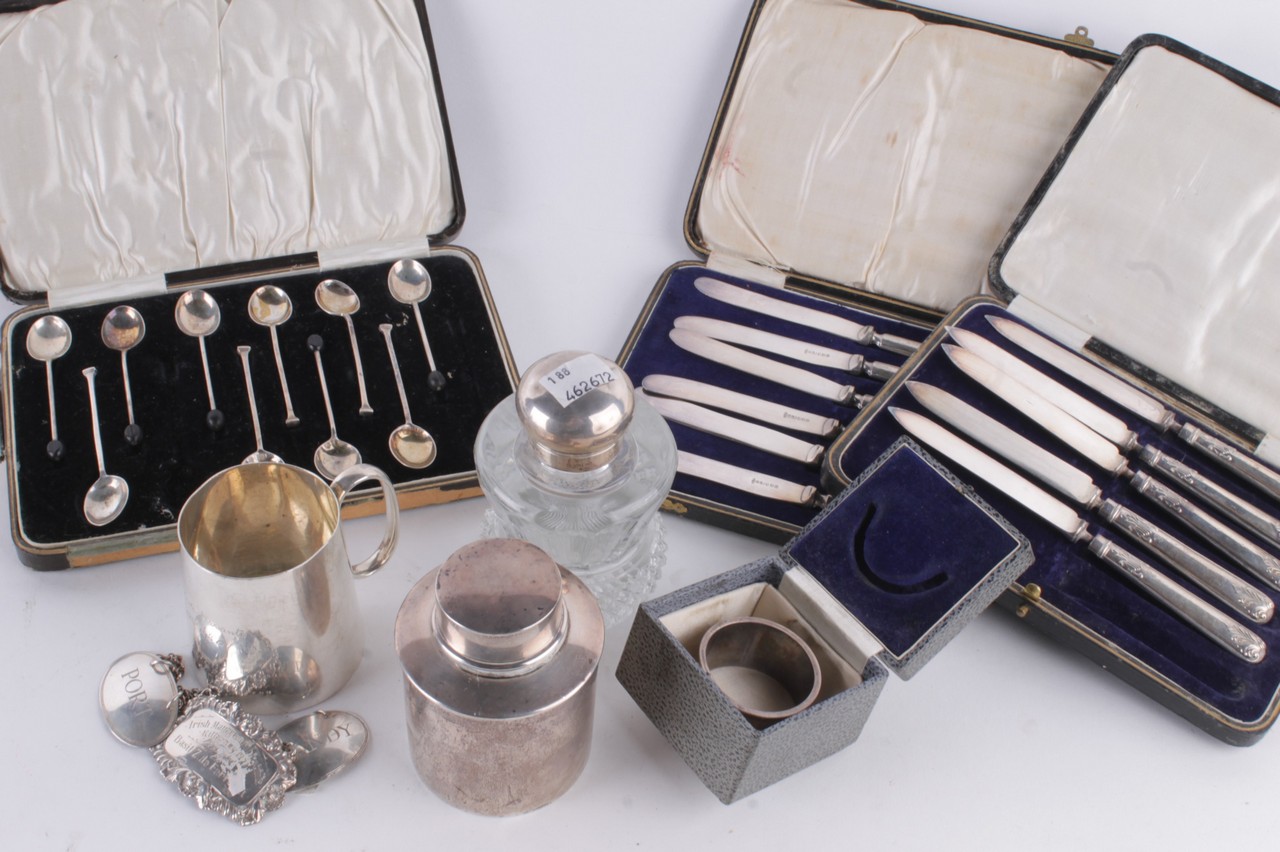 A collection of silver items, to include: a cut glass inkwell with silver cover and mount by John