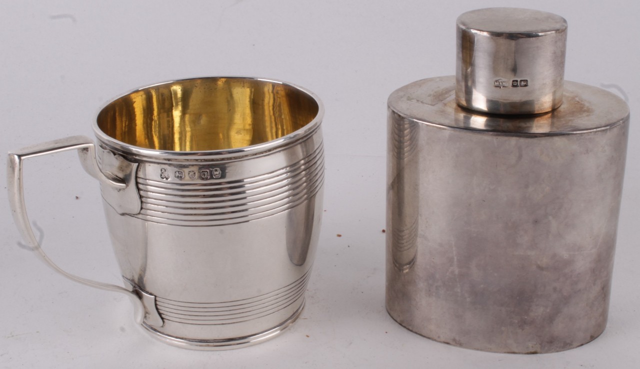 A George III silver mug by Rebecca Emes & Edward Barnard I, London 1811, with a scroll handle and