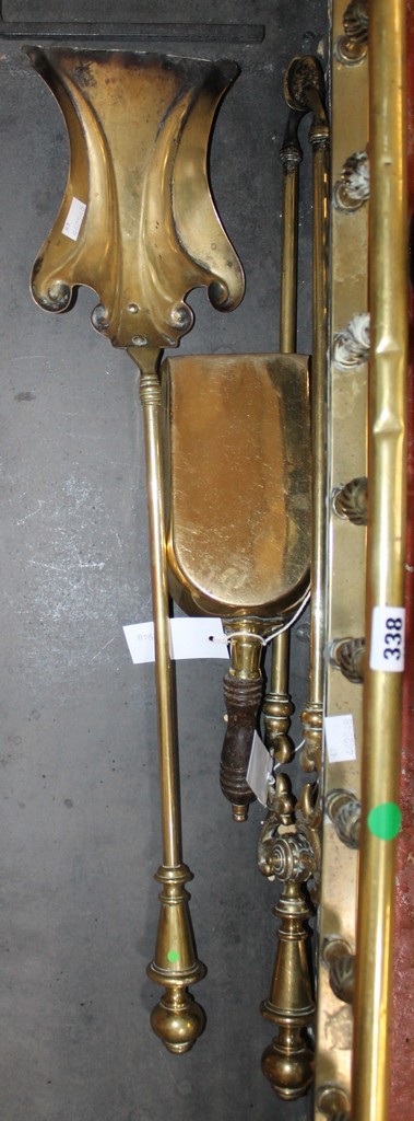 A 19th century pierced brass fire fender and a set of fire irons. There is no condition report - Image 2 of 2