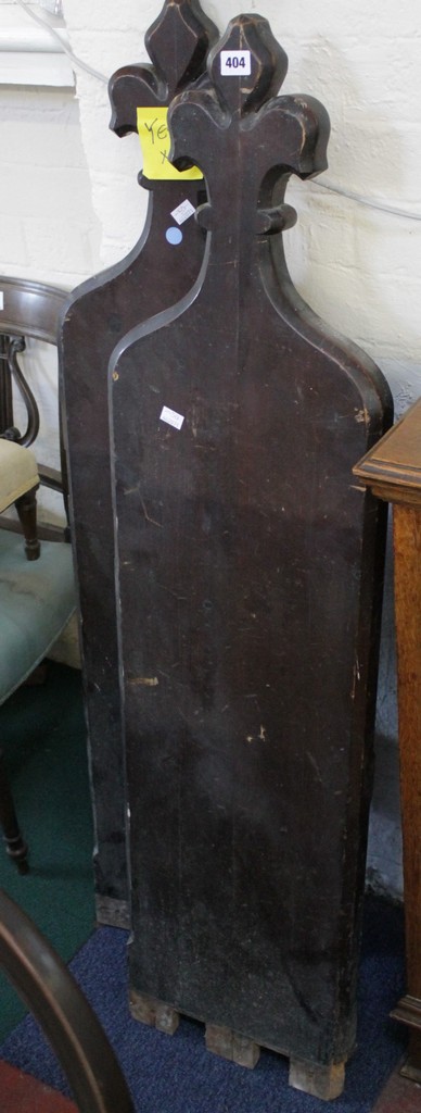 A pair of Victorian stained pine church pew ends A conditon report in not available on this lot.