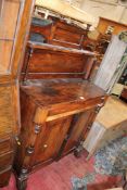 A Victorian rosewood chiffonier with raised back over cabinet below