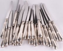 Twelve French electro-plated table knives and eleven dessert knives by S.F.A.M, the table knives