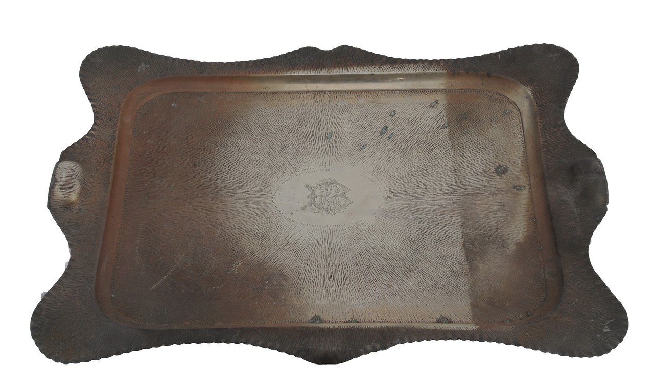 An electro-plated shaped rectangular tray, with a sunburst effect decoration and engraved with