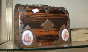 A Victorian calamanderwood, brass and porcelain-mounted rectangular casket, with domed lifting