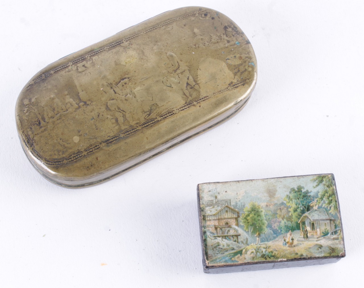 A 19th century papier mache snuff box, the cover painted with figures near a river, 5.8cm long; a