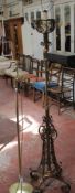 Two brass standard lamps (sold as parts). A condition report is not available on this lot.