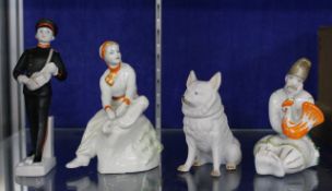 Four Russian porcelain figures. There is no condition report available on this lot.