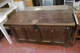 An 18th Century linen fold front chest 152cm wide