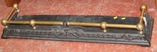 A Victorian brass and iron fender 121cm length A condition report is not available on this lot. Best