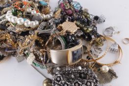 * A group of costume jewellery, to include: bangles; necklaces; earrings; and other items