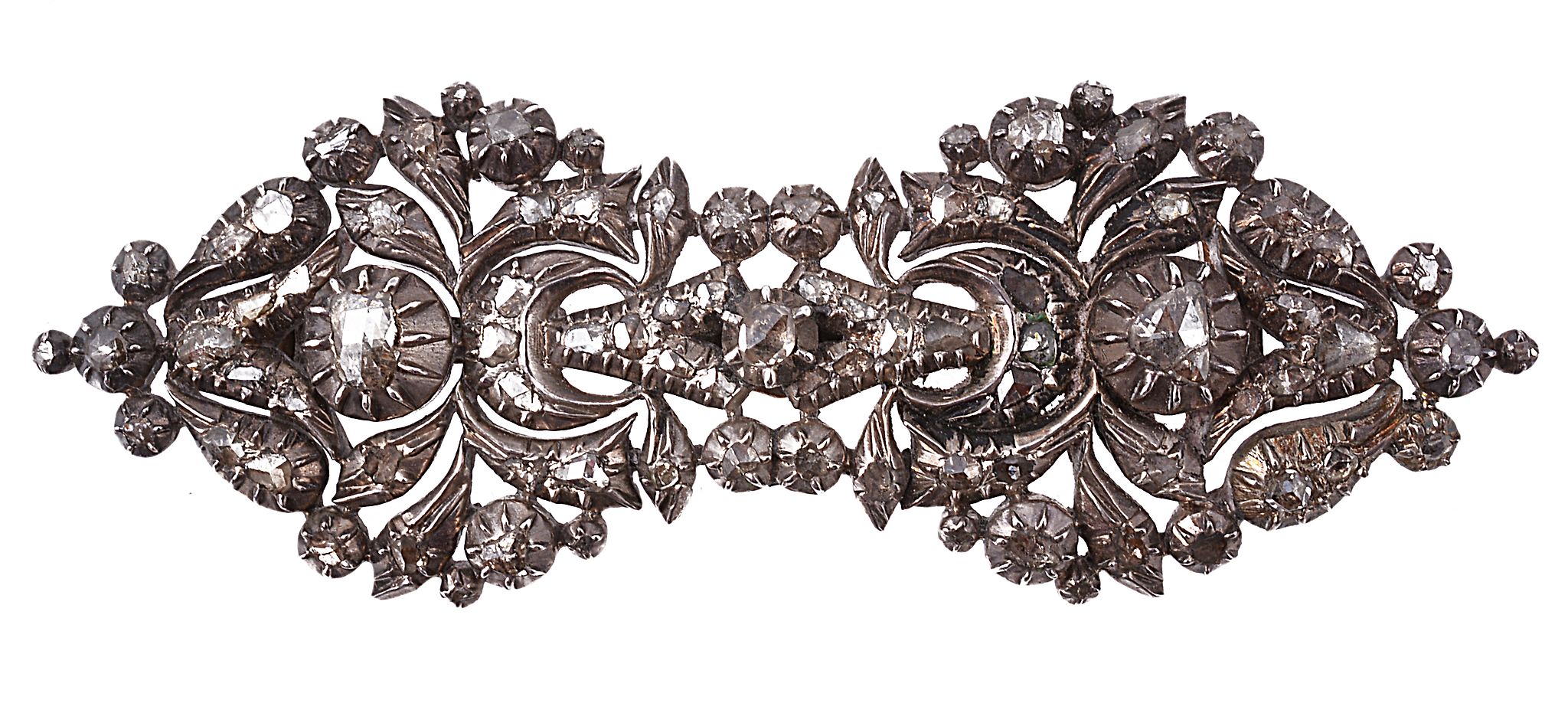 A rose cut diamond brooch , the pierced foliate panel with cut down collet...  A rose cut diamond