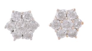 A pair of diamond cluster ear studs, set with brilliant cut diamonds  A pair of diamond cluster