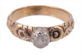 A late Georgian diamond ring, circa 1820, the oval shaped old cut diamond in...  A late Georgian